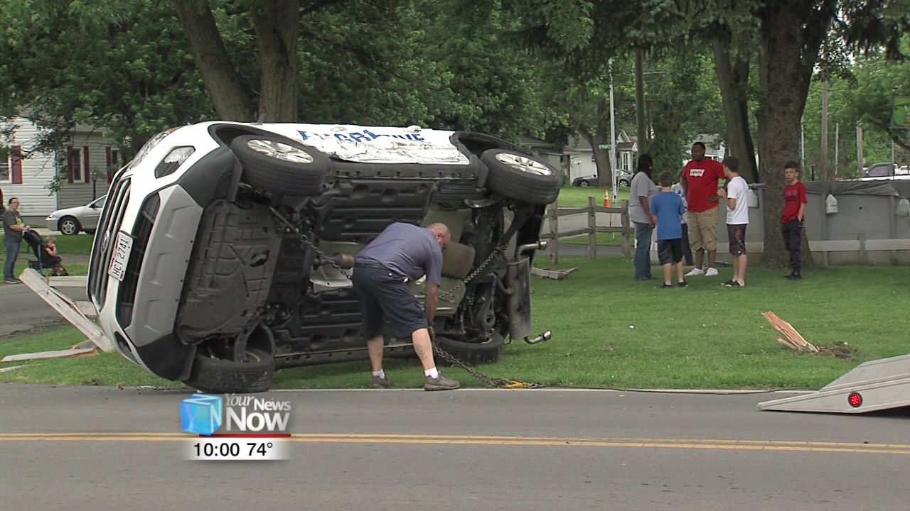 Car flipped on its side in two-vehicle crash 1.jpg